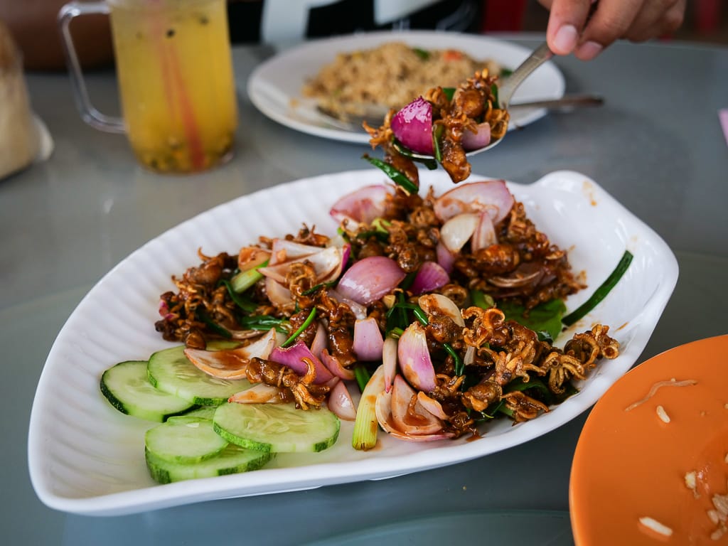 Eating fresh seafood in Kukup, Malaysia